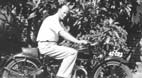 Alex & his Douglas motorcycle in the backyard